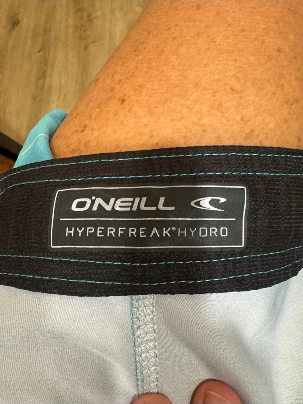 O'Neill Blue and Orange Striped Board Shorts